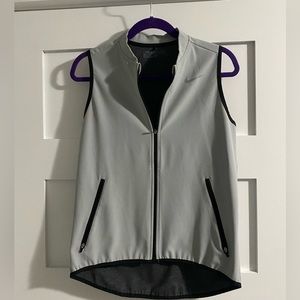 Nike gold vest. Worn once. New quality!